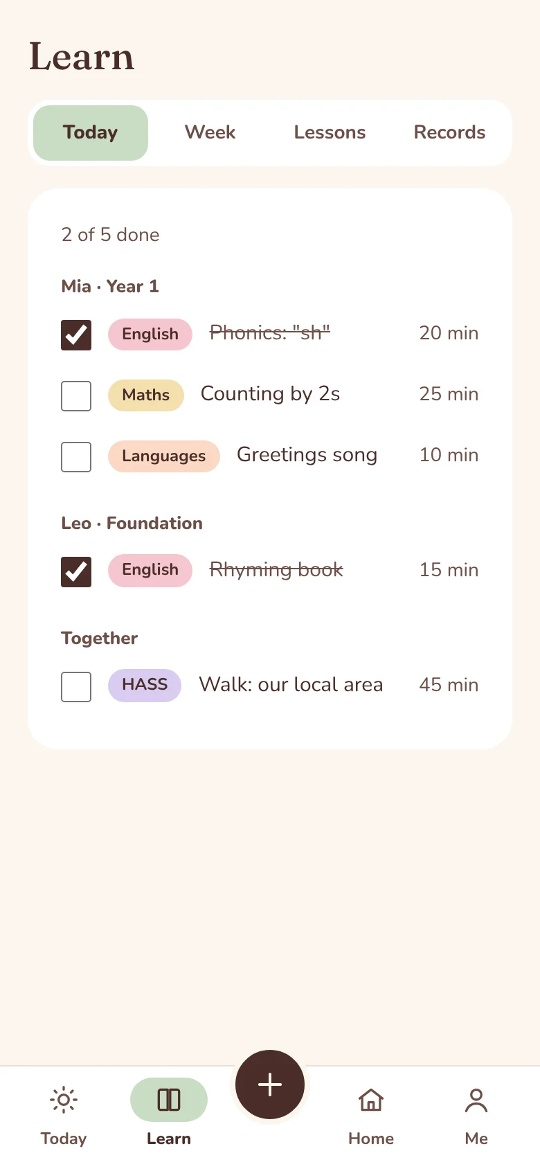 Honeypetal on a phone showing today's lessons for two children, with tick boxes